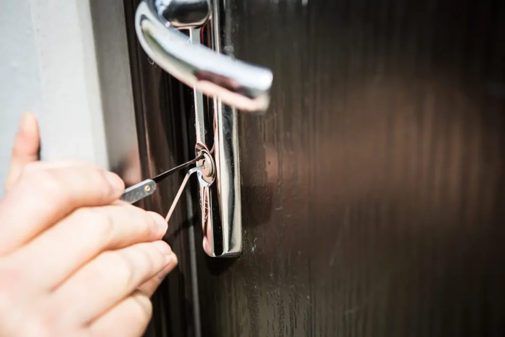 locksmith helping out with lockout tools to open door